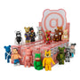 A group of colorful Medicom Bearbrick Series 45 bear-shaped collectible figures is displayed on and around pink boxes, featuring a variety of unique designs, colors, and costumes. The display sits in front of a large sign showcasing a bear face with an @ symbol—making it a must-see for fans of Medicom’s iconic blind box collectibles.