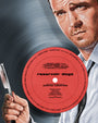 A man in a suit holds a straight razor beside a vinyl labeled “reservoir dogs,” channeling Super Sounds of the Seventies. Cast and crew names circle this Neil Davies archival pigment print with Quentin Tarantino credited as writer/director.
