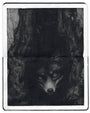 illustration in an open face Moleskine notebook depicting a wolf animal emerging from a tree trunk by artist Sam Wolfe Connelly