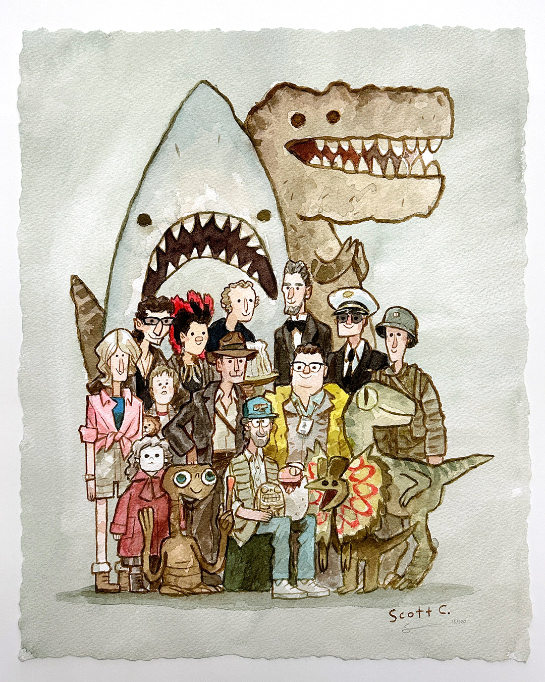 A limited edition watercolor illustration by Scott C. showcases E.T., Indiana Jones, Jurassic Park dinosaurs, and the Jaws shark from Spielberg films all posing together on textured paper.