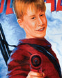 A blond boy in a red sweater smirks confidently, aiming a red toy gun at the viewer in this Home Alone-inspired Deadly Prey digital print, featuring blue and red graphic text on 100lb card stock.