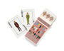 Two playing cards labeled JOKER showcase illustrated men in suits. The open box beside them, branded Max Dalton, reads Wes Anderson’s Playing Cards Volume One and features illustrated characters on the cover, reflecting custom designed playing cards created by Max Dalton.