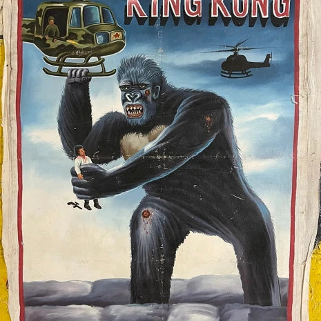 A painted poster from Deadly Prey depicts King Kong holding a woman and grabbing a helicopter, with another helicopter nearby. The KING KONG title at the top evokes the iconic Deadly Prey exhibition art style.