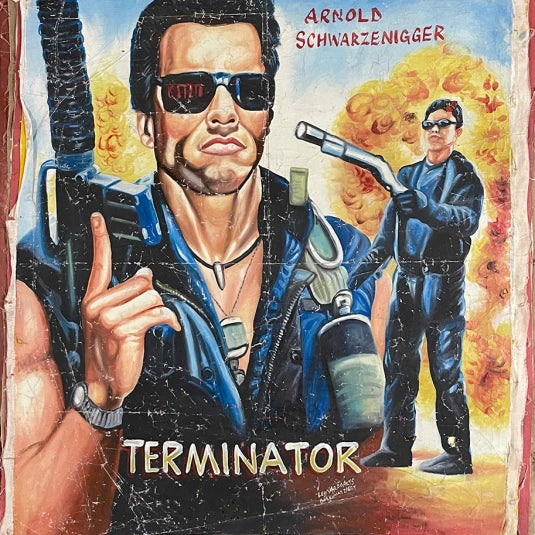 A hand-painted Deadly Prey artwork inspired by Terminator, showing two muscular men in black sunglasses and leather—one close up with a gun, the other in the background. Arnold Schwarzenegger’s name stands out in bold red.