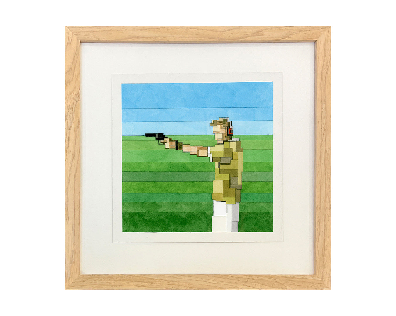 A pixelated image in the style of Adam Lister shows a person in a shooting stance with a pistol, wearing tan attire and ear protection. Watercolor on paper enriches the grassy field and sky hues, all elegantly framed with light wood.