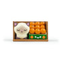 A cute figurine of a white cat with pink ears sits in a box beside a tray of orange fruits with smiley faces on the box—part of the Bodega Kitties collection by 100% Soft, this vinyl blind box figure brings irresistible charm and playful vibes to your shelf.