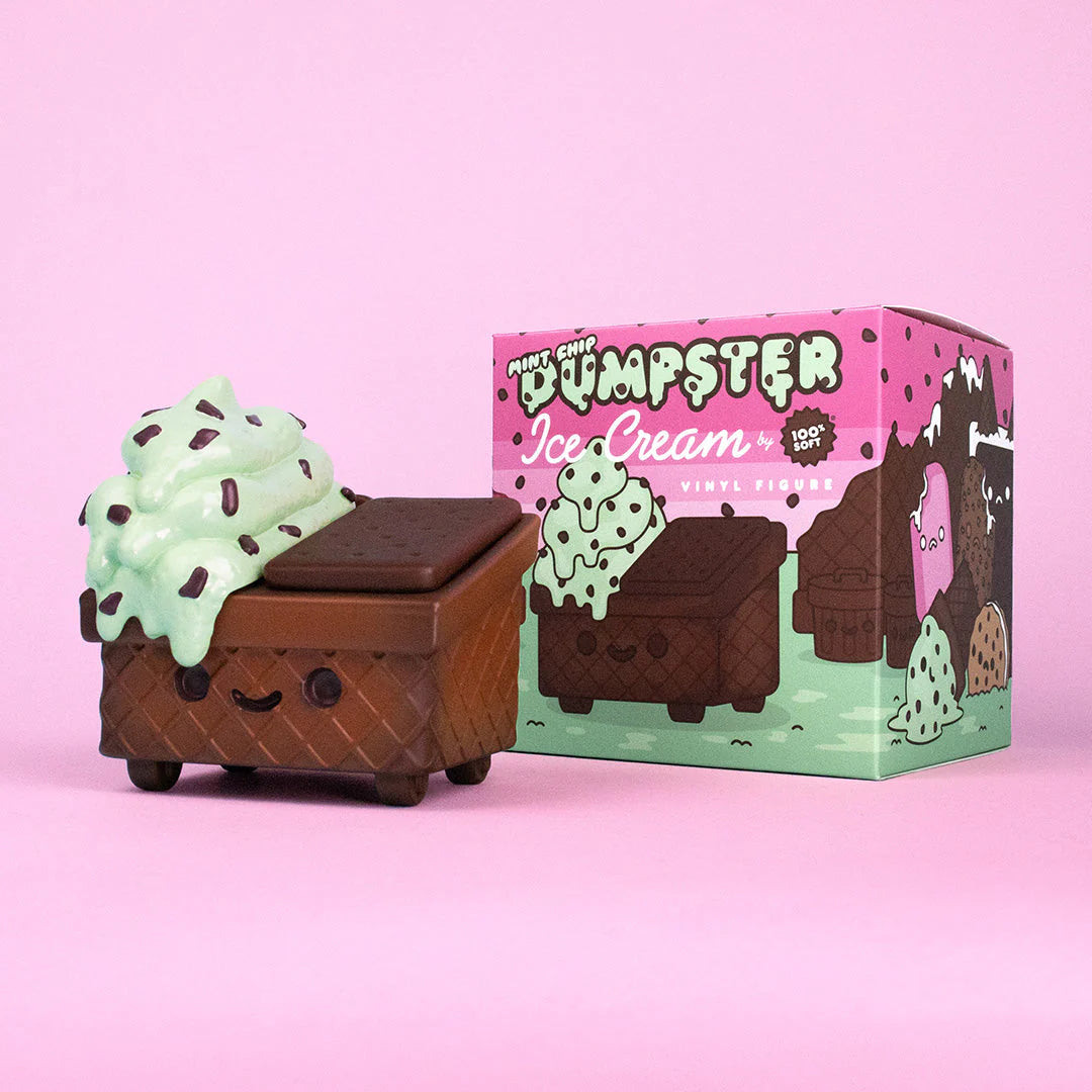 A cute 100% Soft Dumpster Ice Cream Vinyl Figure featuring a smiling dumpster topped with mint chocolate chip ice cream, packaged in a vibrant pink and green box labeled "Dumpster Ice Cream.