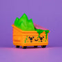 A cute orange Dumpster Fire Vinyl Figure by 100% Soft features a smiling face, green goo spilling out, and a bright green pile inside—ideal for quirky collectible fans.