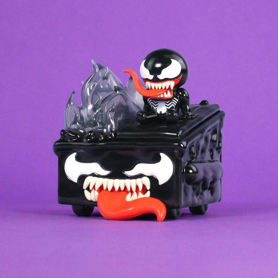 A 100% Soft Venom Dumpster Fire with Venom-inspired features—including sharp teeth, white eyes, and a red tongue—sits on a purple background with a small Marvel vinyl figure on top, making it the perfect symbiote collectible for fans.