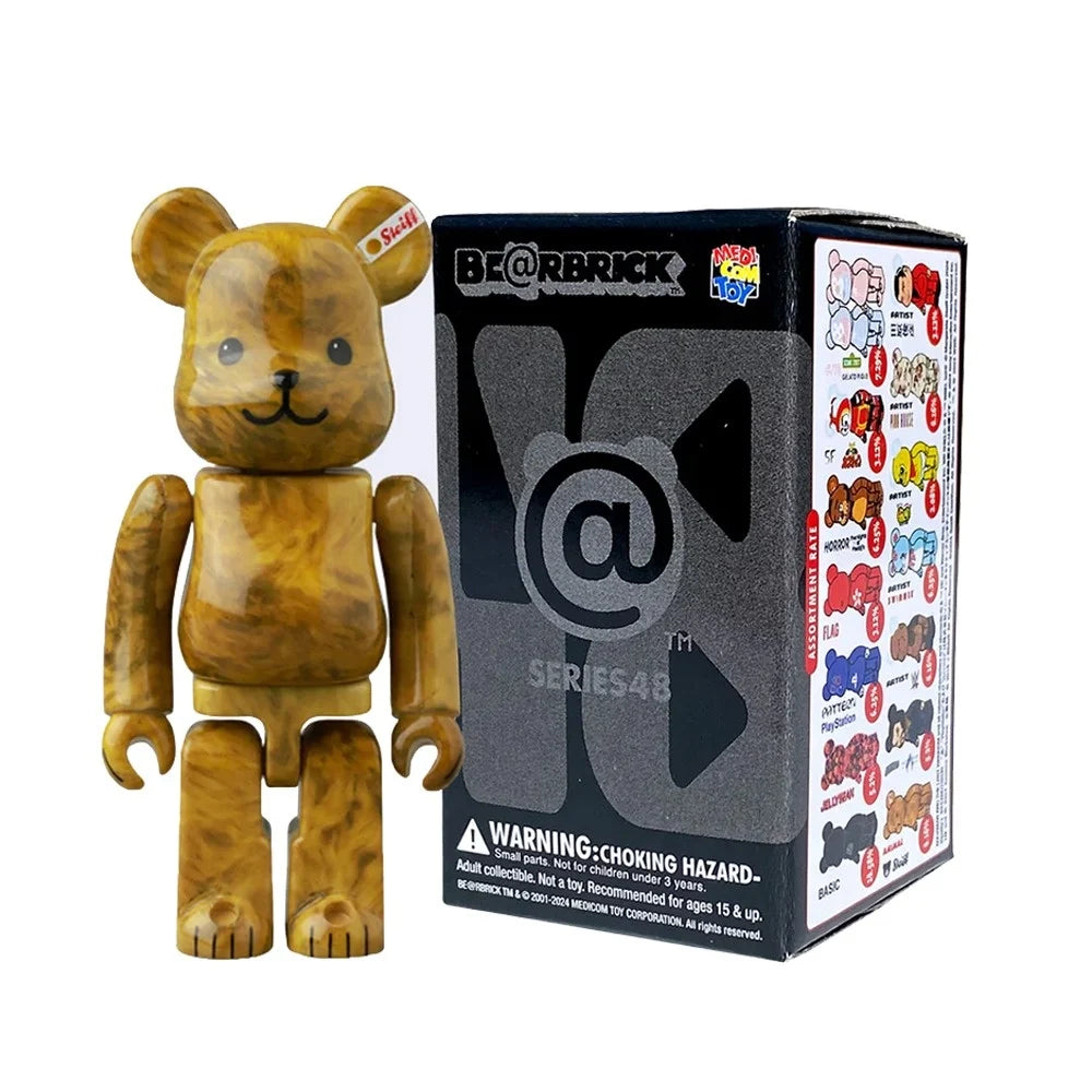 A wood-grain Bearbrick figure from Medicom's Bearbrick Series 48 stands beside its sleek black box, adorned with vibrant Bearbrick illustrations and a choking hazard warning for ages 15 and up. Produced by Medicom, this collectible offers the thrill of a blind box surprise for your collection.