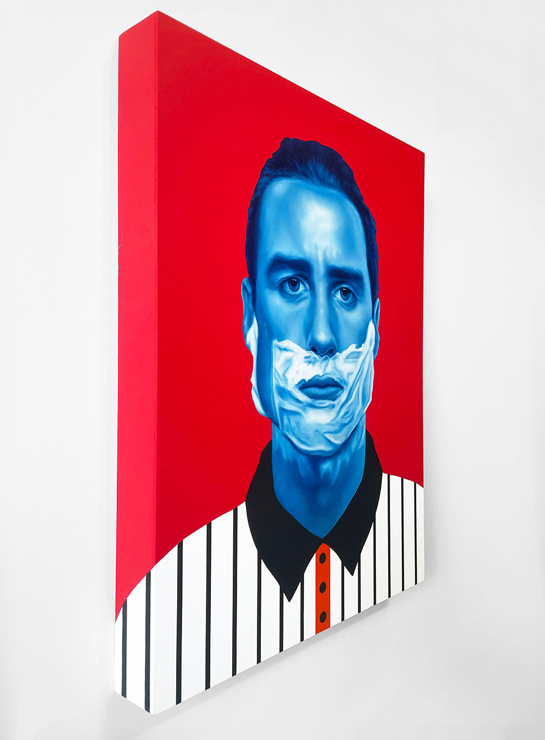 Morgan Booths vivid painting Tomorrow depicts a blue-skinned man in a striped shirt with orange buttons against a red background. Created with oil and acrylic, it captures his serious expression and white beard-like mark from an angled view.