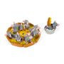 Seven gray clay mice with pink ears are playing on a faux pizza, while one mouse lounges in a small dish nearby—an adorable scene that brings to mind the 100% Soft Pizza Rats Vinyl Figure from their blind box collectible series.