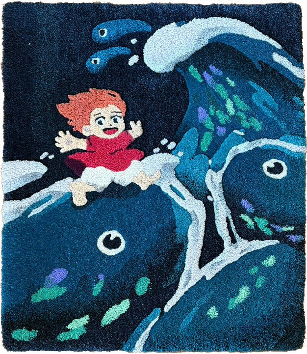 A vibrant Spoke Art rug in hand-dyed wool yarn depicts a red-haired girl in a red dress riding Jeany Ngo Wave-inspired blue fish, with water splashes and two smaller fish accenting the lively design.