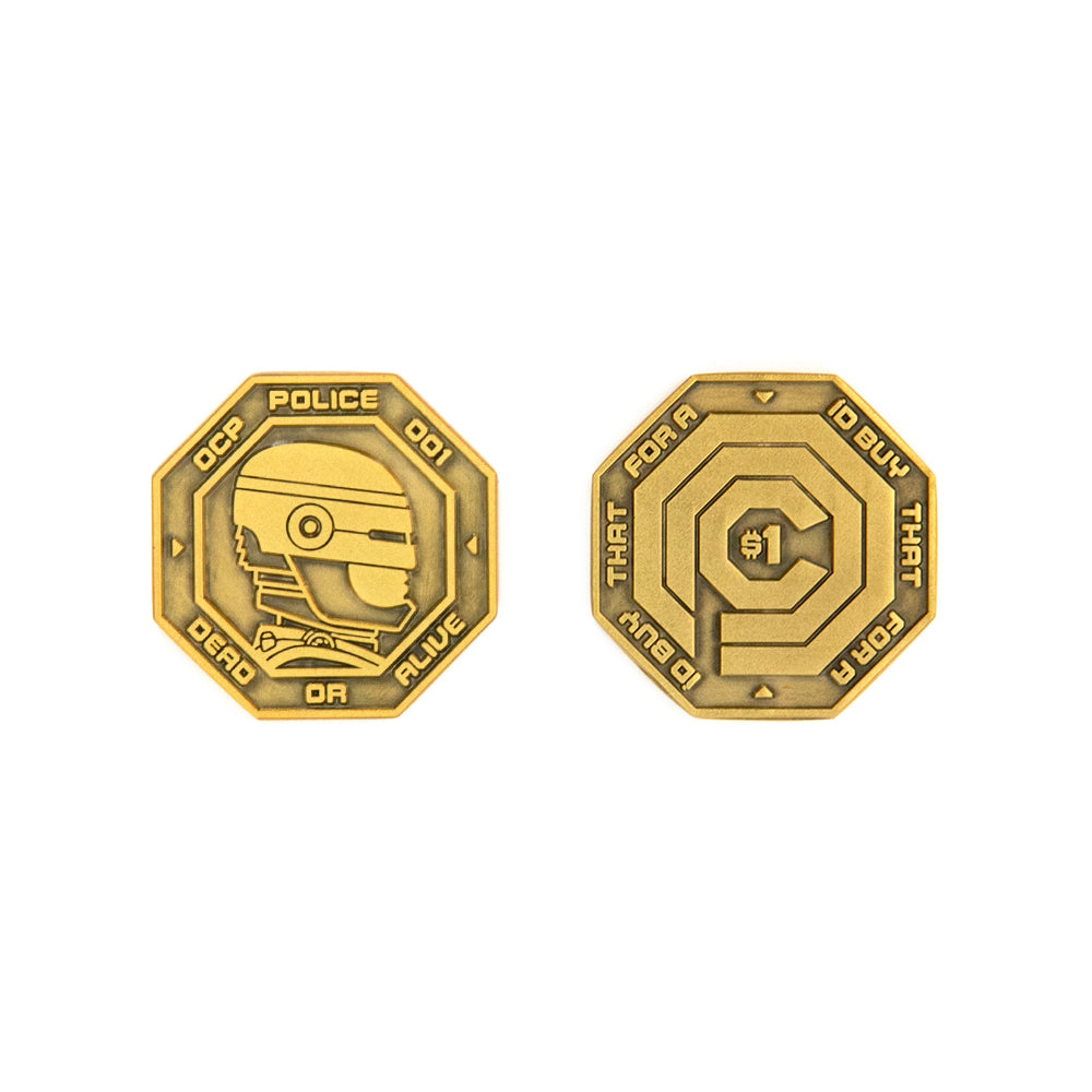 A gold, octagonal metal token by Bruce Yan shows a robotic helmet with “OCP POLICE 001 DEAD OR ALIVE” on one side, and a target plus “I’D BUY THAT FOR A $1” on the other. Brand: Bruce Yan.