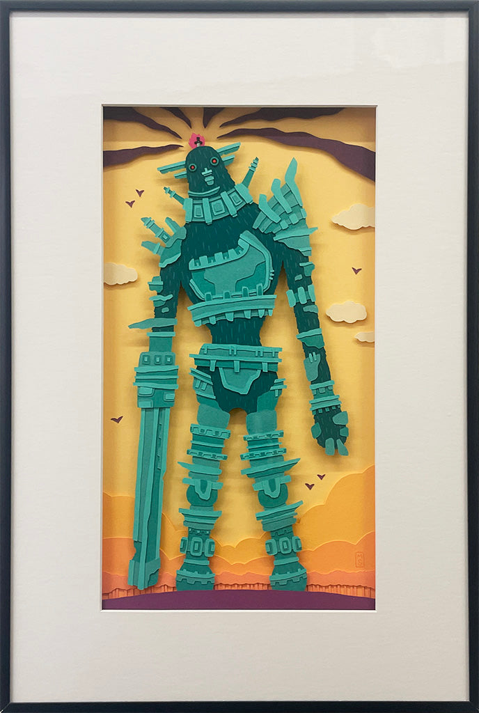 Framed artwork of a green robot-like figure against a yellow background