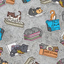 Playful cartoon cat vinyl stickers from 100% Soft feature adorable kitties sleeping on blankets, eating pizza from a box, playing in a recycling bin, and sitting in a Free Kittens box—all scattered across a textured gray background. These weatherproof, die-cut stickers are ready to add some fun and personality to your space!.
