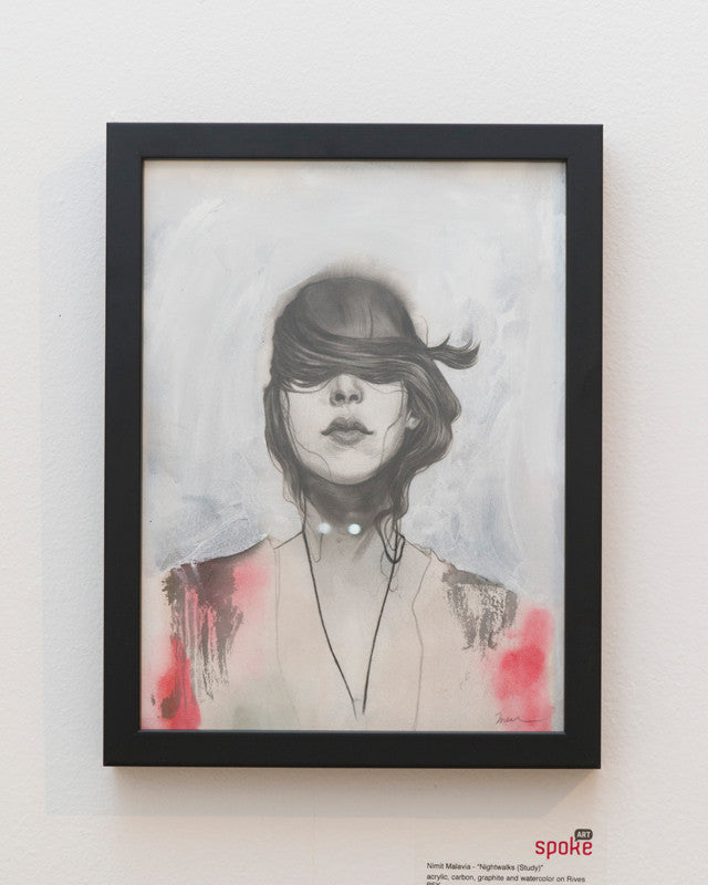 Framed artwork of a mysterious figure, eyes hidden by flowing hair and wearing a light top, set against a soft blend of grays and pinks reminiscent of Nimit Malavias style.