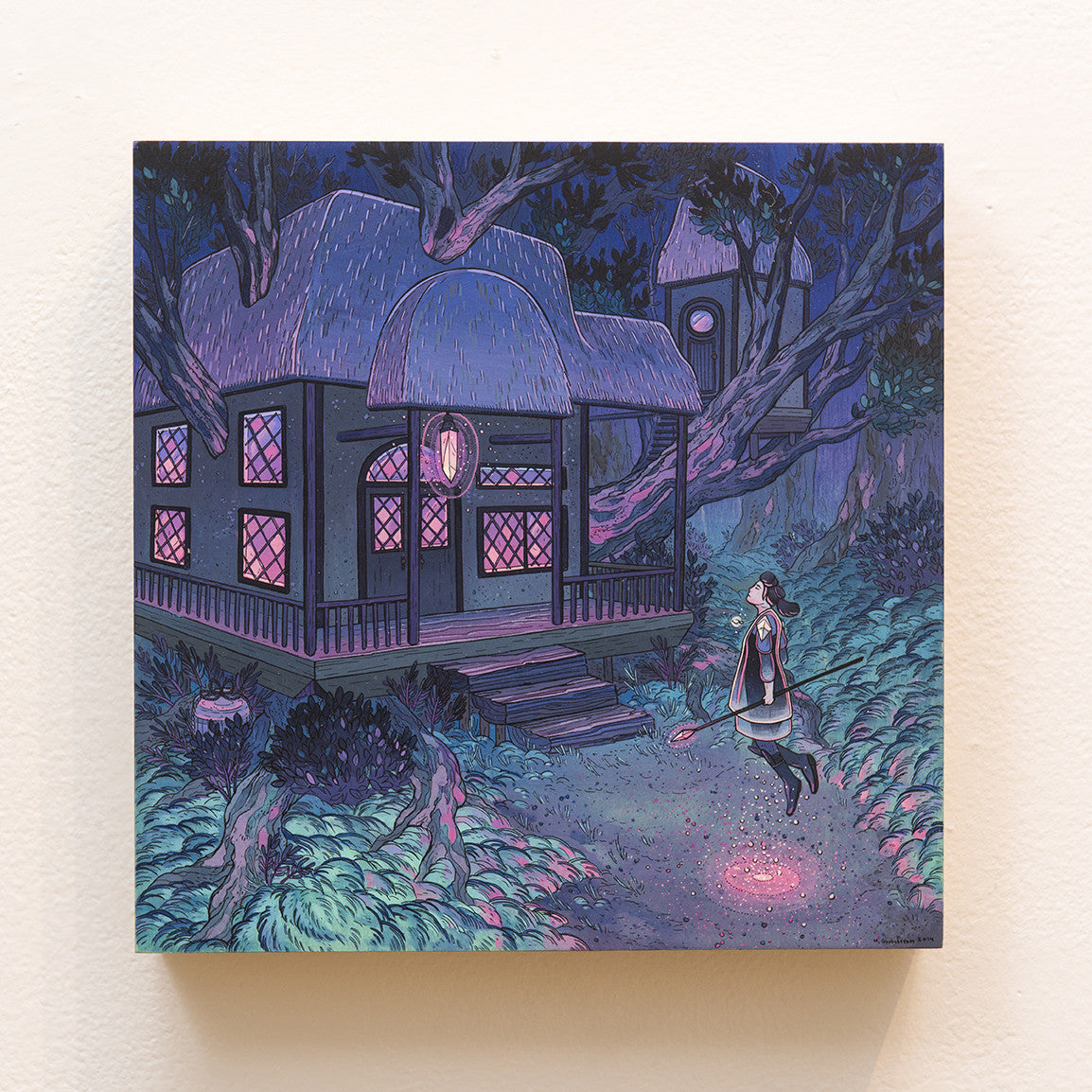 In an art gallery, a captivating scene by Nicole Gustafsson shows a woman levitating on a broomstick before a whimsical house nestled among large, twisting trees, with the sky aglow in pink and purple hues, enhancing the mystical ambiance.