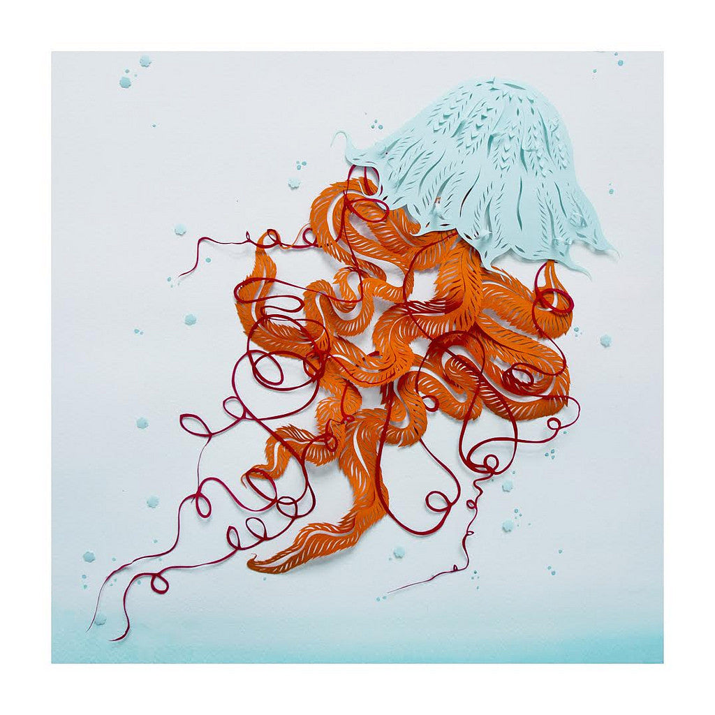 Jellyfish in the Light: A striking paper art by Sarah Dennis, showcasing a light blue top with intricately crafted orange and red tentacles using Paper Cuts on a pale background.