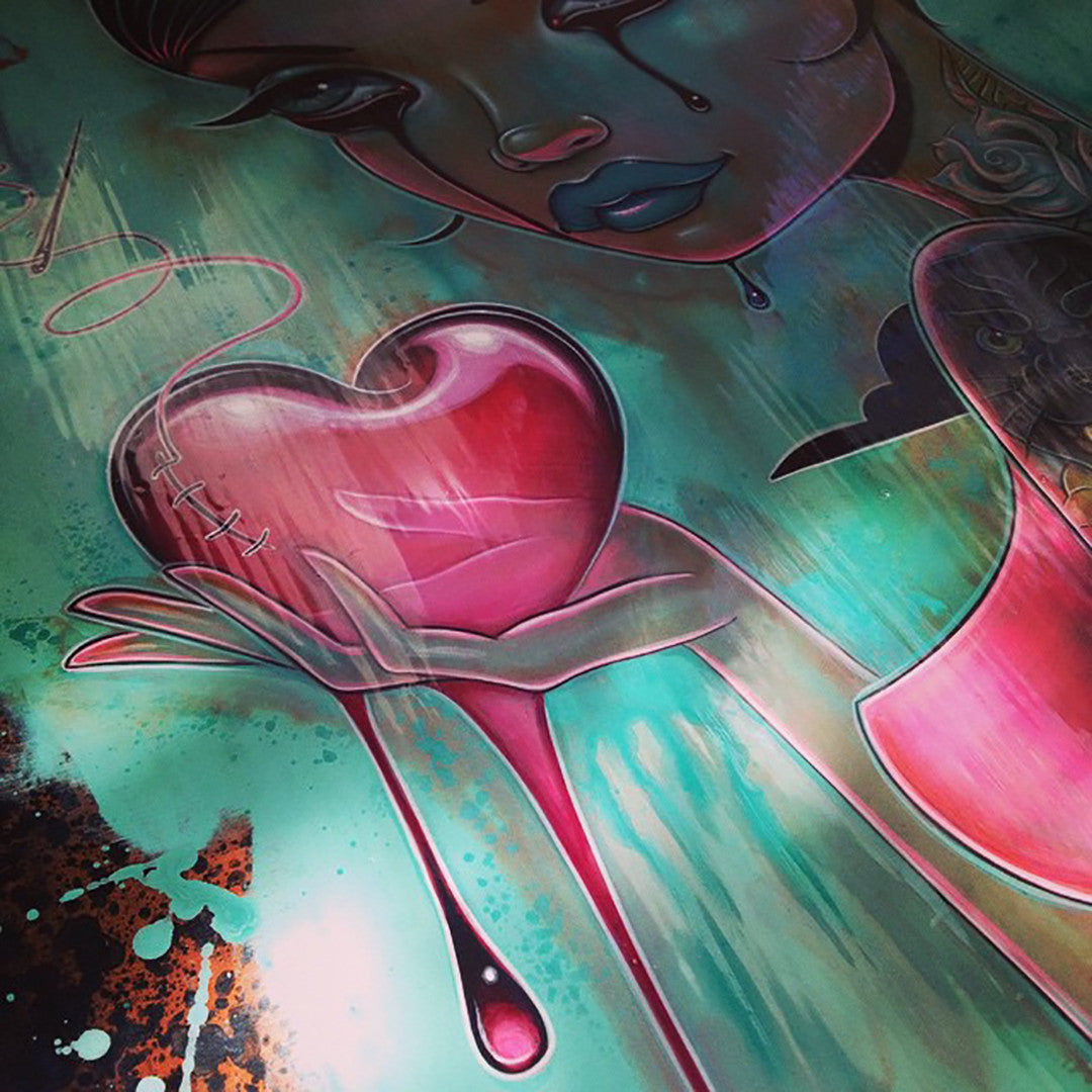 Acrylic on wood panel, Stitched Up by Caia Koopman features a stylized crying woman holding a stitched red heart against teal and black splatters.