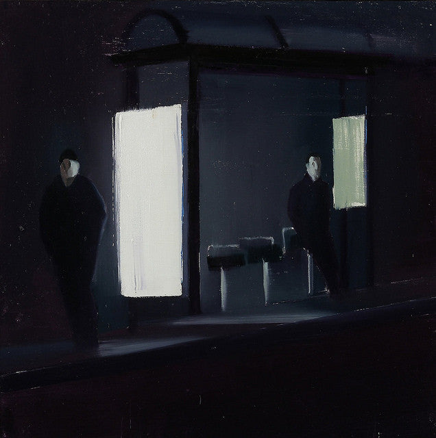 A moody painting by Brett Amory depicts two shadowy figures at a night bus stop. This oil on wood panel is dimly lit by a glowing advertisement, casting light on the pavement and figures, creating a mysterious and serene ambiance.