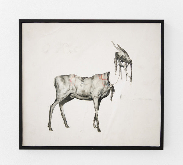 A framed mixed media artwork by Joao Ruas showcases a surreal four-legged animal with its intricately detailed head and neck suspended above its body on strings against a stark white background.