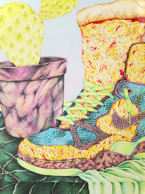 A colorful Cahill Wessel shoe reminiscent of Spoke Art, with a cheese-like texture and bright blue details, sits next to a potted cactus. Its laces are green and yellow against soft pastel tones, and the marbled cactus pot nicely complements this Supersonic Invitational piece.