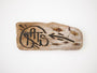 A GATS rustic wooden sign with black graffiti-style text and a right-pointing arrow is mounted on a white wall, its wood resembling burnt driftwood for added worn charm.