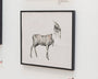 Joao Ruass mixed media artwork features a surreal, headless antelope intertwined with a skeletal head. Crafted in neutral tones with detailed skull rendering, it evokes a haunting visual reminiscent of an eerie Horse Study.