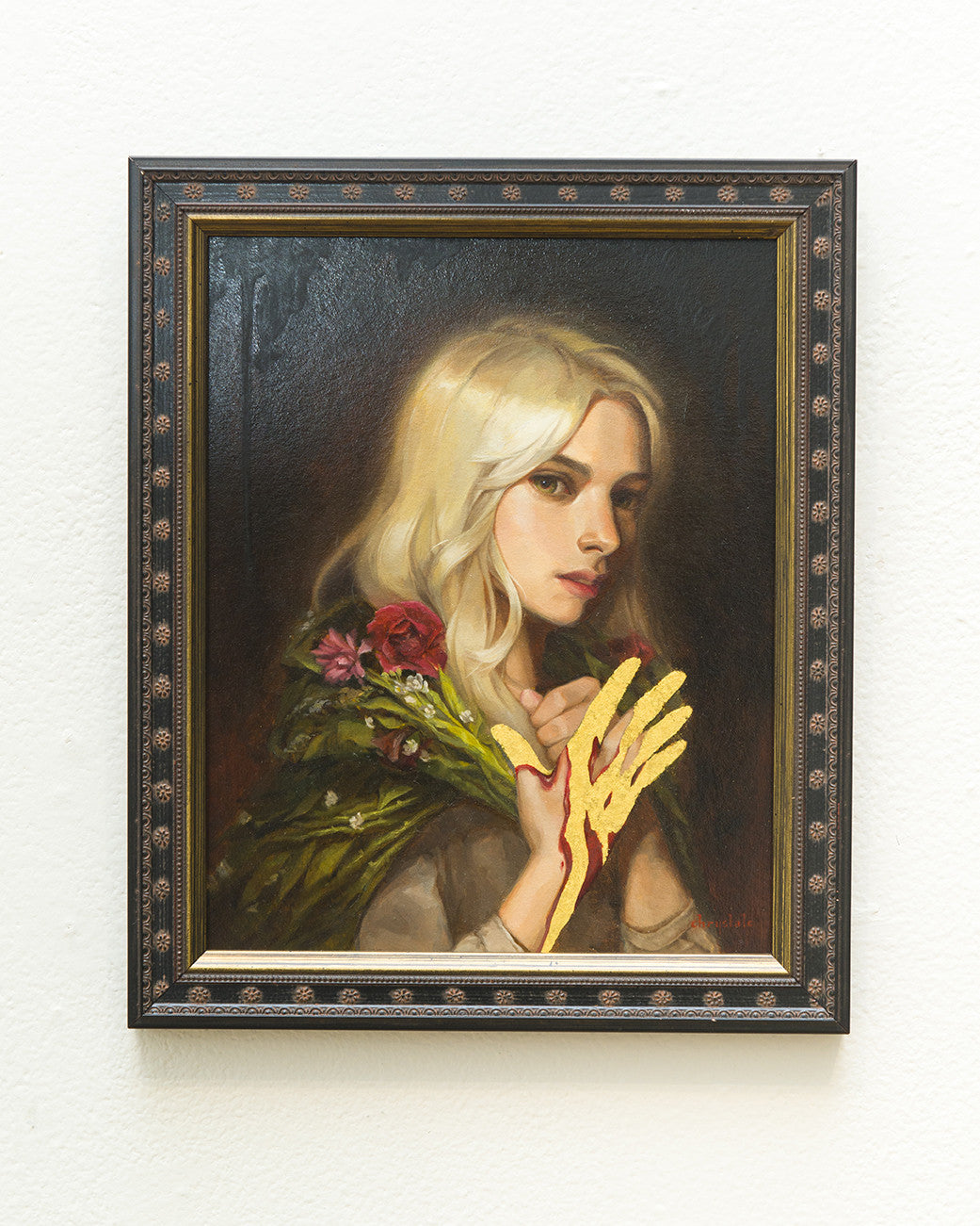 At the Spoke Art Gallery, Chrystal Chans framed painting depicts a woman with long blonde hair holding red and pink flowers. Dressed in green with oil and gold leaf on her hand, her solemn expression is beautifully accentuated by the dark background.