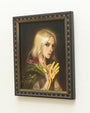 Chrystal Chans framed oil and gold leaf painting features a blonde woman with yellow gloves and red flowers, calmly gazing at the viewer. Her pale complexion contrasts with the dark background, enhancing the vibrant colors. Showcased at Spoke Art Gallery.