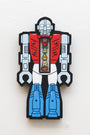 This vibrant hand-cut wood artwork by Matt Ritchie showcases a robot with bold red, blue, and white tones. A transparent center reveals three smaller stacked robot heads, elegantly mounted on a pristine white wall.