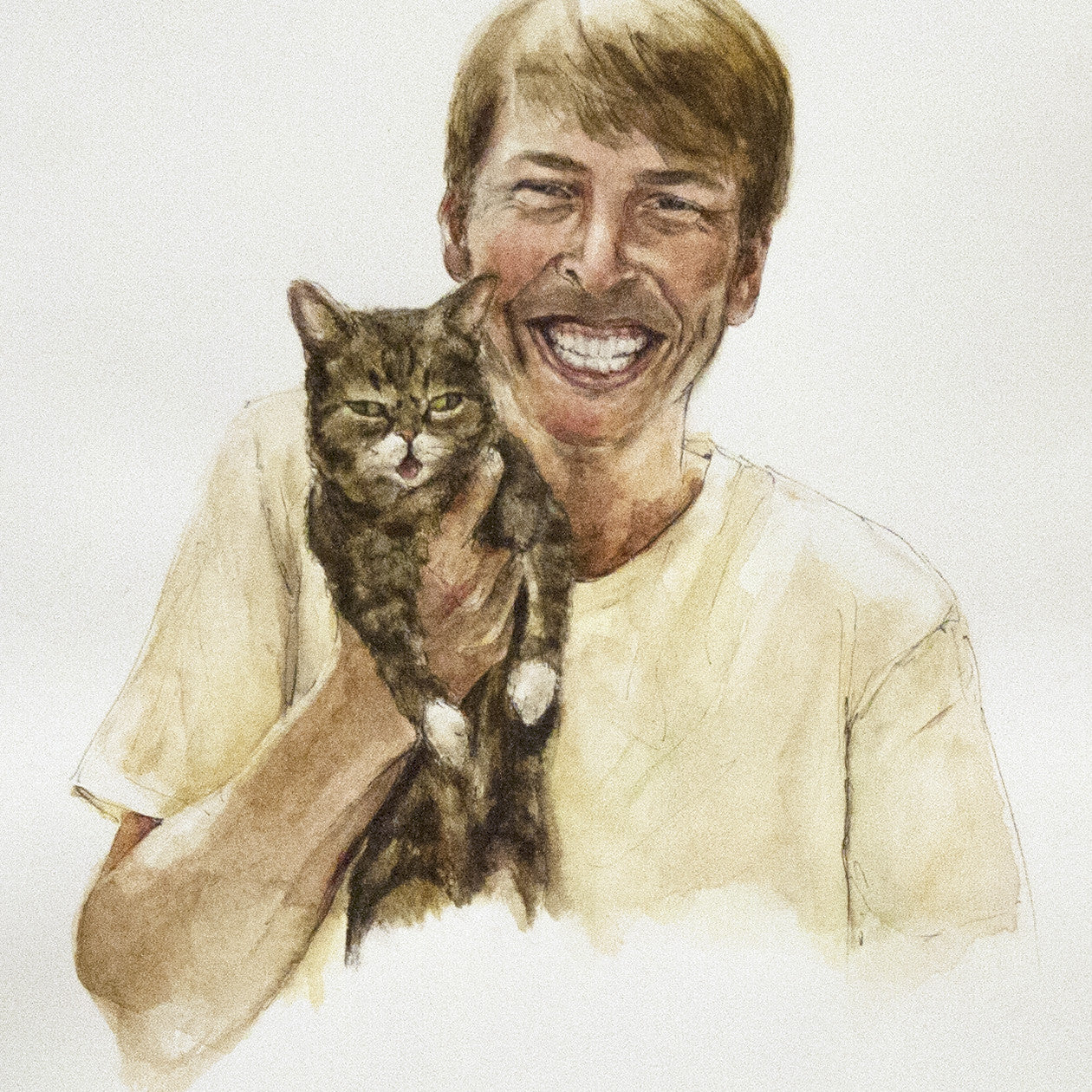 A person with short hair in a light-colored shirt smiles widely, holding Lil Bub close. The cat gazes forward calmly, ready for display like mesmerizing watercolor art by Christine Hostetler in a San Francisco gallery.