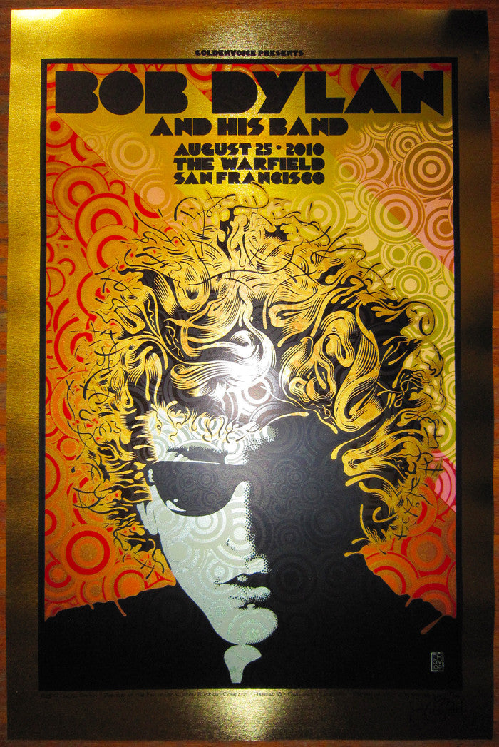 Bob Dylan and his band concert poster designed by Chuck Sperry, featuring a stylized portrait with swirling patterns in bold colors. This Brushed Gold Foil Edition commemorates the August 25, 2010 show at The Warfield, San Francisco.