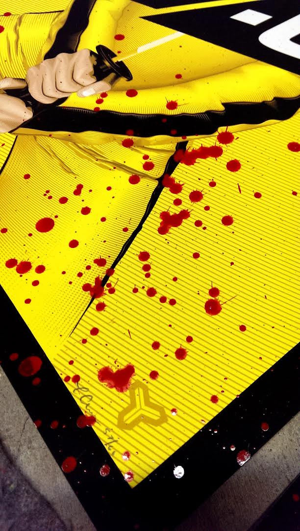 A silkscreen print poster by Tracie Ching showcases a yellow-haired warrior in vivid yellow gear with a katana, surrounded by red liquid splatters resembling blood. The mainly yellow backdrop is bordered in black and includes an abstract symbol in one corner.