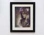 Tatiana Suarezs framed art features a stylized woman with flowing hair adorned with white flowers, set against an ethereal background. It creates a dreamy effect like Queen of the Night, displayed in a black frame on a white wall at Spoke Art San Francisco.