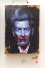 Strange Carnival, an oil on canvas by John Wentz, features a person with a stern expression. Blue and red brushstrokes partially obscure the face against a dark background, enhancing its enigmatic allure, and is priced at $500.