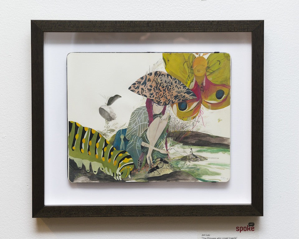 This Jon Lau framed artwork channels The Princess who Loved Insects, featuring a surreal scene with an umbrella-like mushroom, colorful caterpillar, and large butterfly. Painted in gouache on Moleskine, it’s set artistically against a white background.