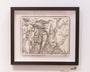 The Brun Croes framed black-and-white illustration features a witch with a broom and a wizard with a beard and pointed hat, surrounded by branches and mystical elements. The detailed graphite pencil artwork hangs elegantly on a white gallery wall.