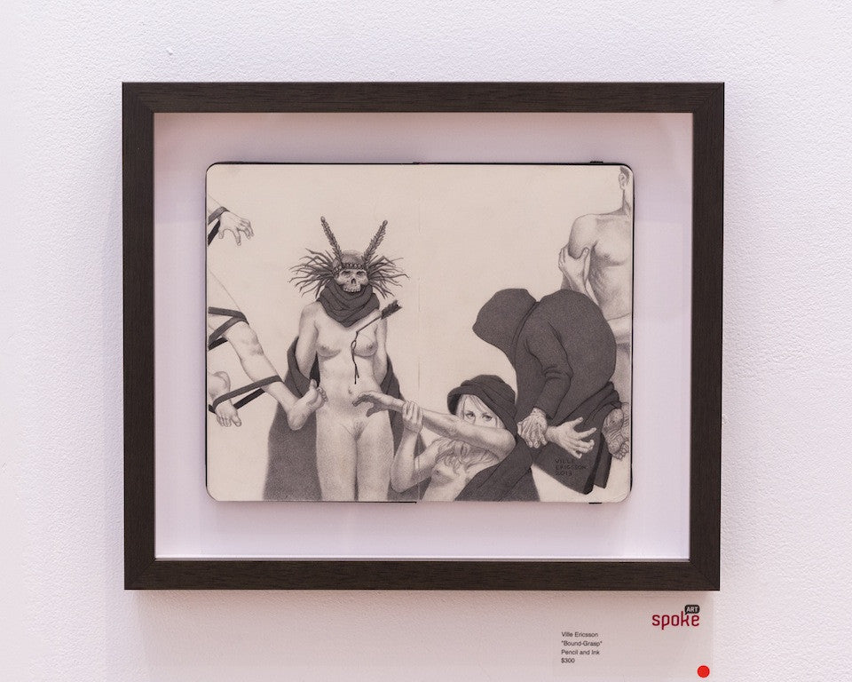 Ville Ericssons framed artwork captures a surreal monochrome scene of partially clothed figures. A figure with an antler-like headdress is sketched with precision, its minimalist background enhancing depth, displayed on a pristine gallery wall.