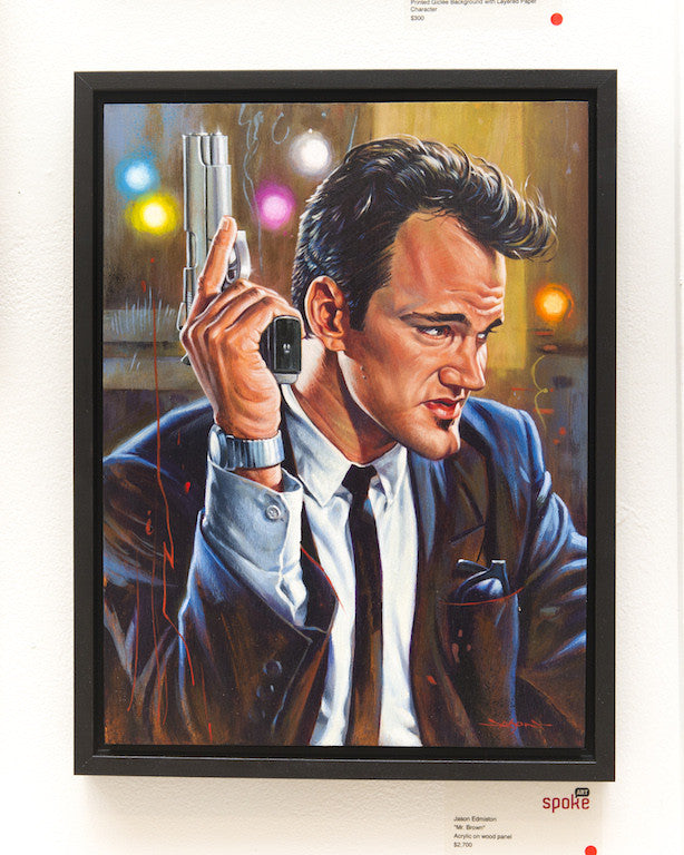 This acrylic on wood panel by Jason Edmiston portrays Mr. Brown in a suit with a gun near his face, set against a vibrant background of blurred lights. The intricate details capture his determined expression and tailored attire perfectly.