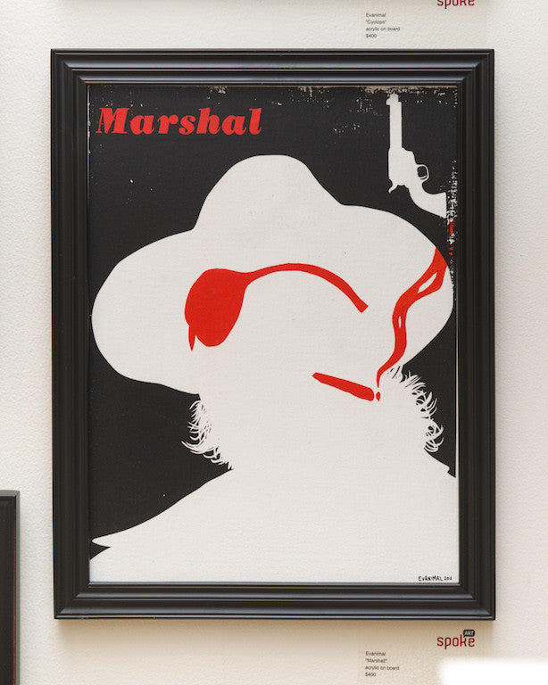 A stylized acrylic poster at Spoke Art Gallery, by Evanimal, features a silhouette wearing a cowboy hat, red pipe, and eye patch. A white revolver is above with Evanimal Marshal inscribed in red at the top left corner.
