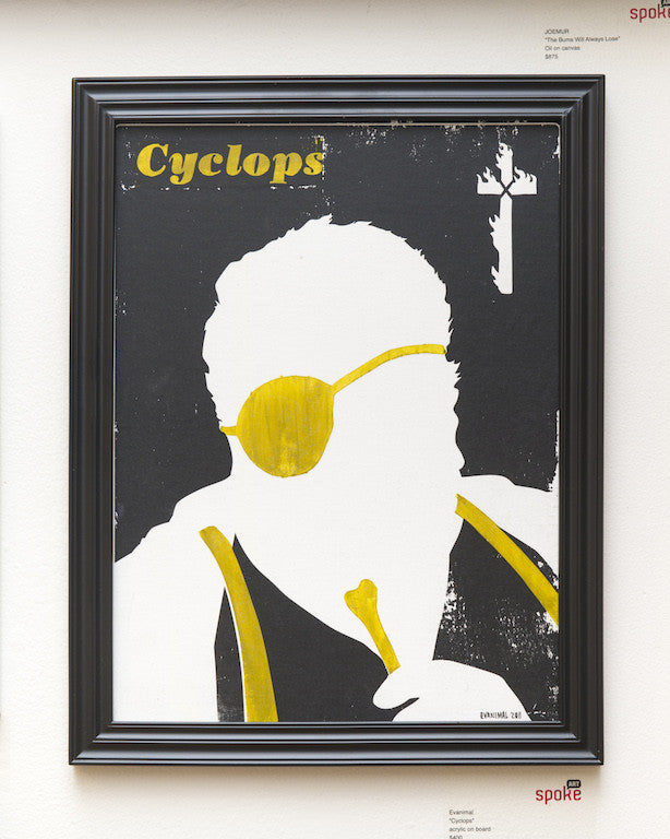 The Evanimal framed poster Cyclops features a stylized figure with a yellow eye patch and sunglasses, set against a black background with abstract designs, reflecting Quentin vs Coens bold graphic style.