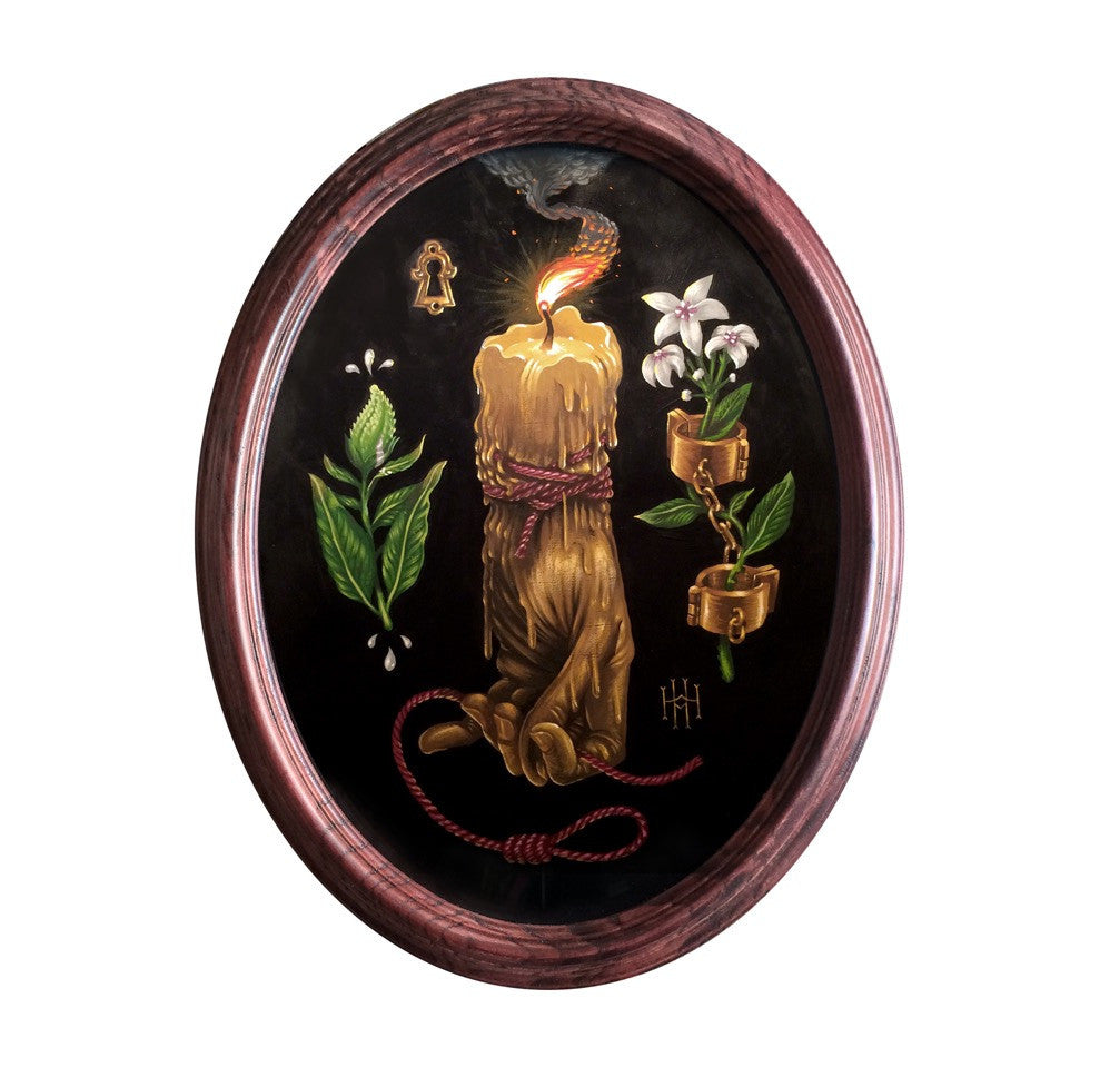 Dan Christoffersons oval acrylic painting features a lit candle wrapped in red rope like a Hand of Glory, with a keyhole, green leaves, white flowers, and a chain with golden shackles. It is set against a black background and enclosed in a wooden frame.