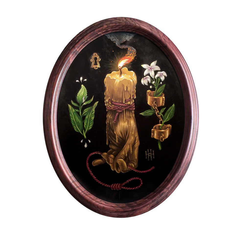 Dan Christoffersons oval acrylic painting features a lit candle wrapped in red rope like a Hand of Glory, with a keyhole, green leaves, white flowers, and a chain with golden shackles. It is set against a black background and enclosed in a wooden frame.