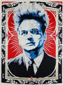 A stylized portrait by Epyon5 showcases a man with wild hair and a serious expression, framed by intricate hand-cut stencils. The background features a red starburst pattern with ornate black and white borders, reminiscent of classic Chinese newsprint.