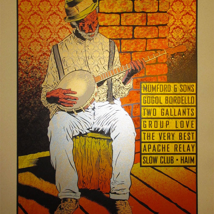 The Chuck Sperry poster features a man playing a banjo on a stool against a brick wall, highlighting the nostalgic charm. It advertises the Gentlemen of the Road Stopover with Mumford & Sons and Gogol Bordello on August 25, 2012, at Monterey County Fairgrounds.