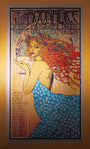 Art Nouveau-style poster by Chuck Sperry features a woman with flowing red hair and a blue starry wrap, holding a cocktail glass. The Gold Edition text showcases Moonalice and event details in decorative fonts set against intricate warm-hued patterns.