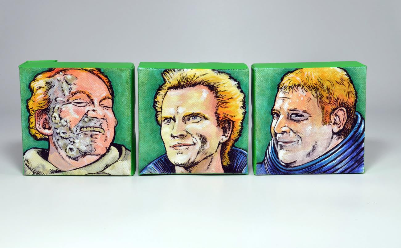 Geoff Trapps set of three green cubes features illustrated portraits of men with distinct expressions and styles, reminiscent of sci-fi or fantasy characters like those from House Harkonnen, standing against a simple backdrop.