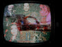 A distorted TV screen shows a cyborg hand holding a gun amid glitchy, vibrant faces. This fine art giclee print on watercolor paper captures surreal chaos and digital corruption, like it was made by Godmachine.